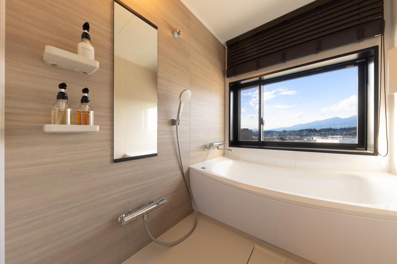 Aqa Hotel Premium Saku Exterior foto